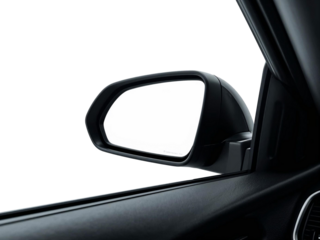 Close-up of car side mirror on white background