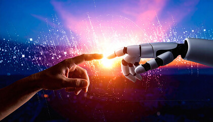 Human hand touching robot finger with glowing connection on blue background. Conceptual technology image of a human hand in a business suit reaching out to touch the fingertip of a robotic hand. 