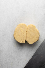 Obraz premium overhead view of tart shell dough on granite countertop, top view of pie shell dough, process of making tart