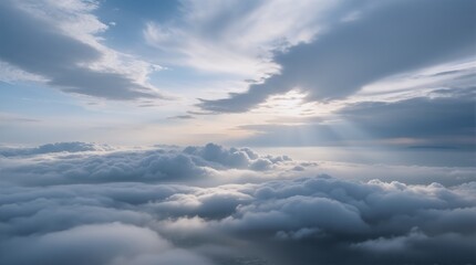 A serene sky above the fluffy clouds, with soft light piercing through the misty veil.