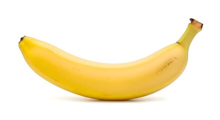 Ripe yellow banana with slight brown spots, isolated on a clean