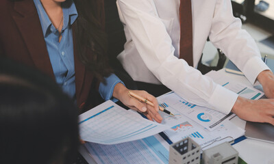 Real estate agent and customer signing contract to buy house, insurance or loan real estate.rent a...