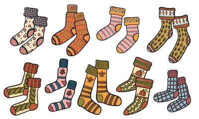 Cozy hand drawn doodle autumn knitting socks collection. Vector fashion concept
