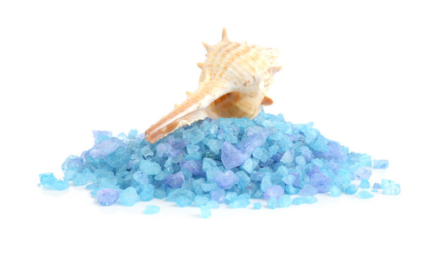 Pile of blue sea salt and shell isolated on white