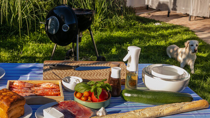 A Mediterranean feast spreads under the sunlit sky, ready for springtime garden gatherings and the quirky International Picnic Day