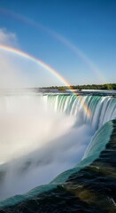 Fototapeta premium Majestic double rainbow over niagara falls waterfall in summer