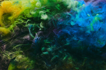 Abstract green blue background. Moving flow of multicolored paints, colorful fluid liquid art