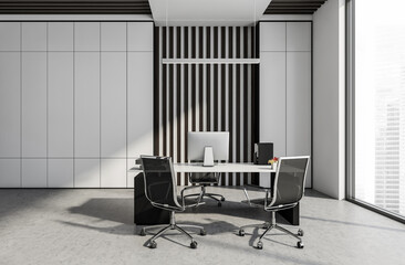 Contemporary office interior with sleek chairs, minimalist desk, and vertical striped wall in a...