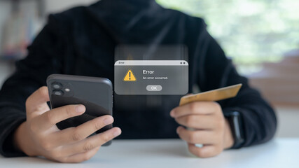 Online payment error concept showing a person using a smartphone and a credit card with a warning message, representing transaction failure, banking issues, and cybersecurity risk in digital finance.
