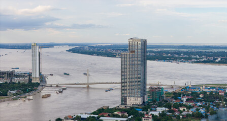 Top view aerial of Phnom Penh capital with development buildings, transportation, energy power...