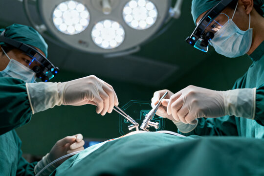 Surgeons performing operation in hospital