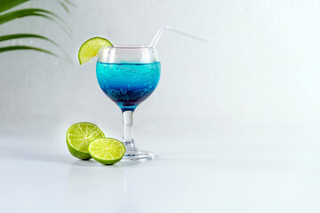 Blue Hawaiian Drink with lime, Blue hawaii cocktail on white  background