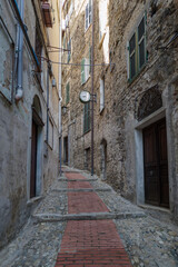 Narrow street in the ancient village of Ceriana, Imperia, Italy