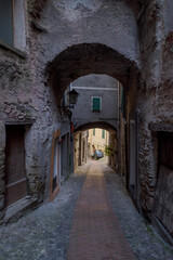 Narrow street in the ancient village of Ceriana, Imperia, Italy