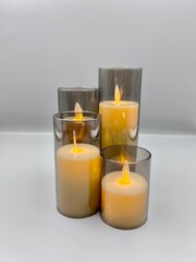 Electronic candles on a light background, Christmas decoration