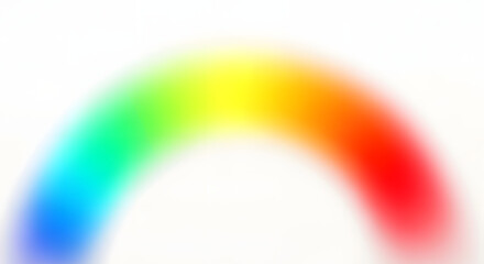 Blurred rainbow arc isolated on white background, creating a soft and dreamy effect with vibrant colors blending seamlessly together
