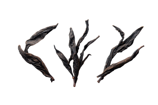 Dark, dried tea leaves arranged