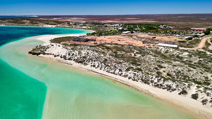 Fototapeta premium Panoramic aerial view of Coral Bay Western Australia with coral reef and tropical seascape