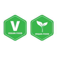 Green hexagonal vegan food stickers isolated on a white background