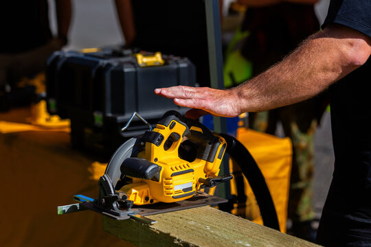 tool demonstrator talking about tool safety during workshop