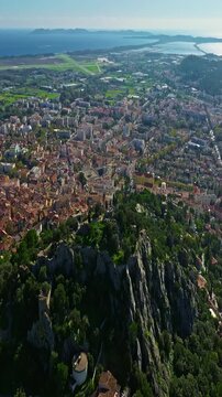  Aerial view of ancient streets and houses of the historic center of the city of Hyeres in the Var department on the azure coast