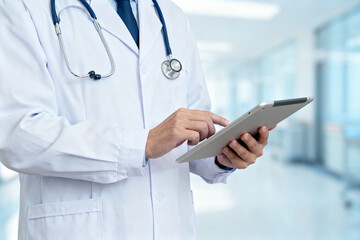 Doctor using tablet in hospital