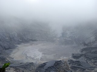 The view of a crater in an active volcano creates a very beautiful and mysterious atmosphere.