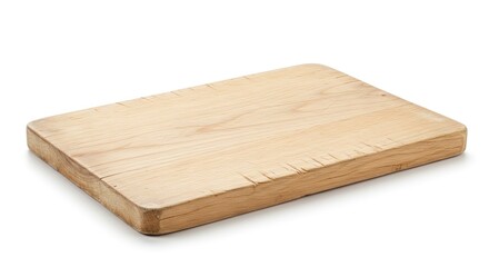 A rectangular lightcolored wooden cutting board rests on a white surface casting a shadow