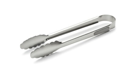 Stainless steel kitchen tongs with scalloped edges lying diagonally on a white surface casting a soft shadow