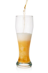Beer flowing into  glass isolated on white background