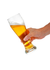 Glass of beer in hand isolated on white background