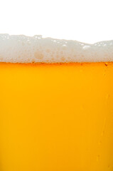Tasty beer with foam in glass  close up