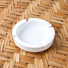 White ashtray on woven mat (1)
