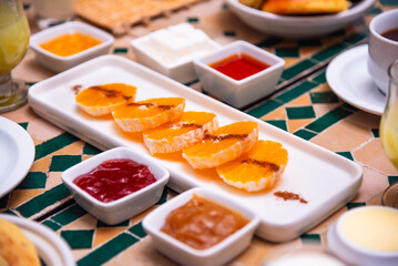 Traditional breakfast in Morocco with oranges and arabic bread