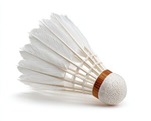 White Feathered Shuttlecock Isolated on Bright Background for Sport and Competition Imagery