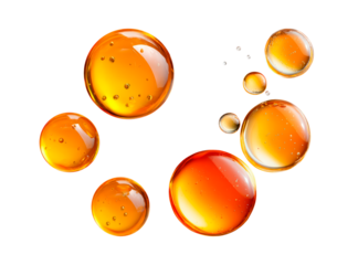 Vibrant orange liquid bubbles floating against black background with shiny highlights