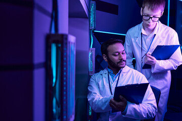 Scientists explore advanced alien technology in a futuristic lab setting