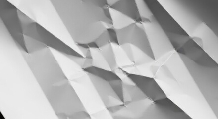 Fototapeta premium Abstract grayscale view of deeply folded, crumpled paper surface