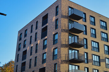 Fototapeta premium Modern residential apartment buildings in Warsaw - contemporary housing development with balconies
