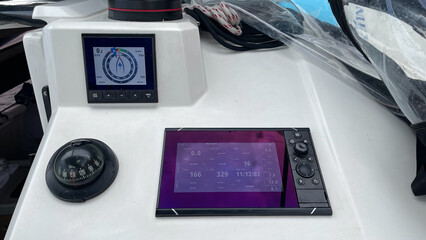 Modern yacht navigation and control system with electronic sailing instruments and compass