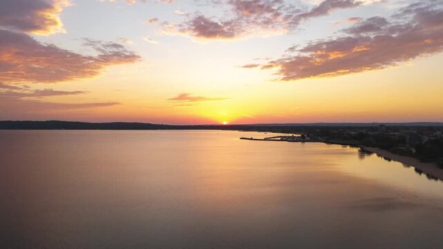Sunrise timelapse over West Bay Traverse City, MI. Shot in 4k, 200 RAW images @ 23.976 fps.  