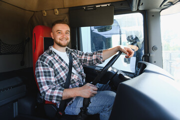Smiling truck driver resting in cabin