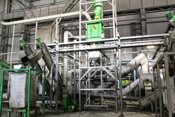 Large Industrial Material Processing and Conveying System. Complex Machinery of Modern Recycling and Sorting Plant. Production Line Infrastructure in a Manufacturing Facility. View of Heavy Industry