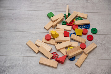 Children playroom interior with scattered toys and blocks, symbol of attention, focus and child development