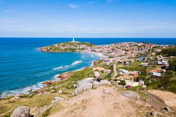 Santa Marta Lighthouse, Laguna - view of the village from the viewpoint with the lighthouse in the background © Jair