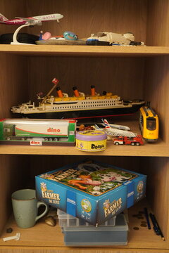 A Detailed Shelf Display of Assorted Toys and Collectibles, Showcasing Leisure Activities and Hobbies