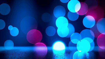 A vibrant abstract background featuring colorful bokeh lights in blue, pink, and teal, creating a dynamic visual effect.