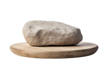 Natural stone rests on a light wooden display platform