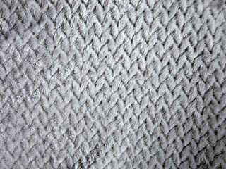 This is a Textured Grey Fabric featuring a beautiful Woven Pattern that enhances its appeal