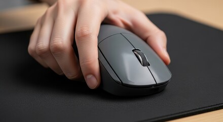 Technology interaction and control convey click and pointing use with a hand holding computer mouse on mouse pad